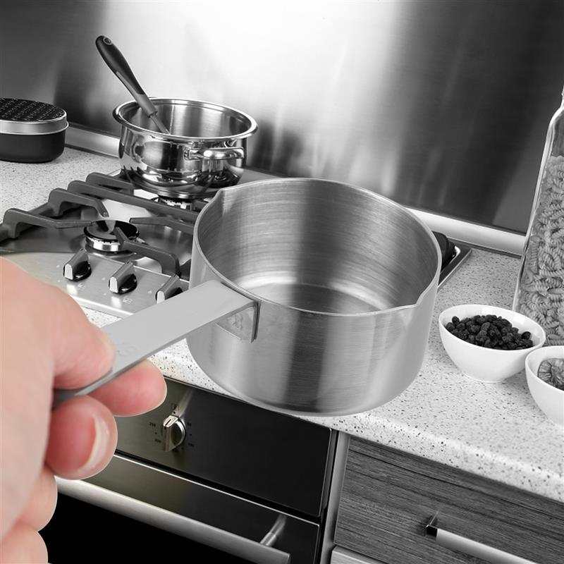 A Set of Stackable Measuring Cups And Spoons